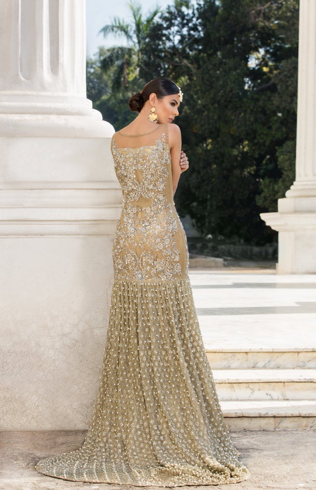 Beautiful embroidered Asian bridal out in alluring gold color