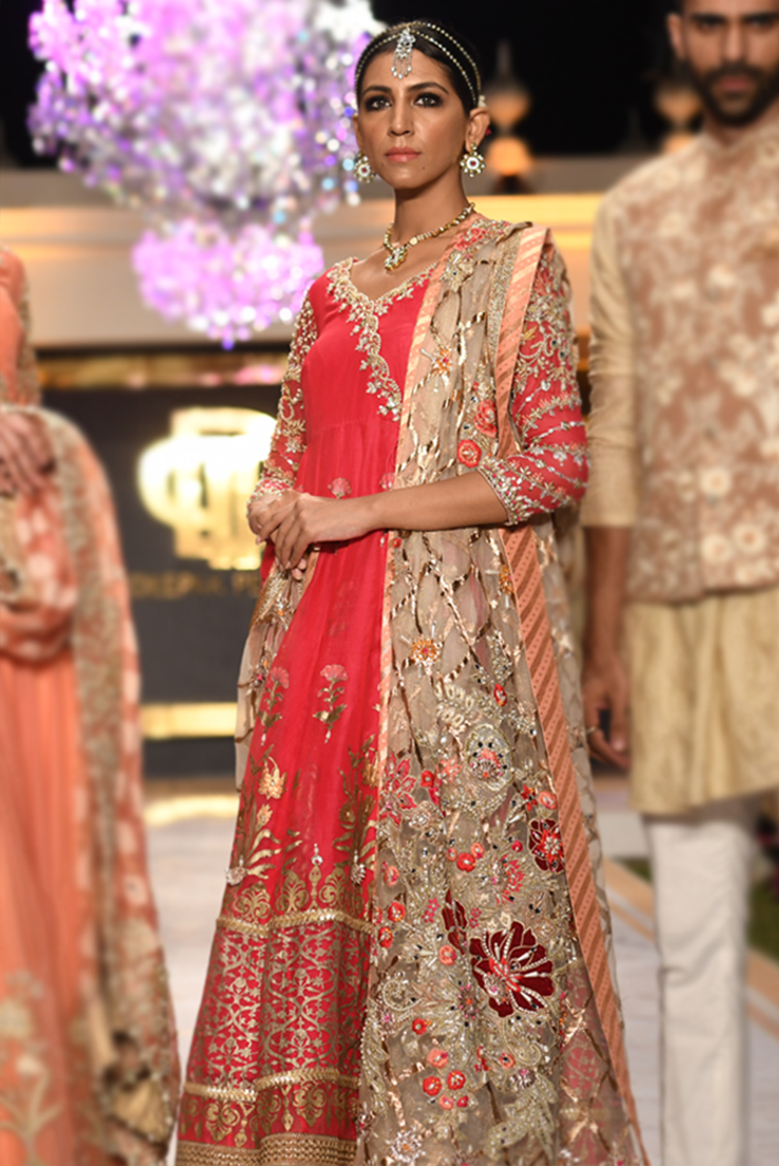 Beautiful bridal anarkali dress embroidered in fuchsia pink color