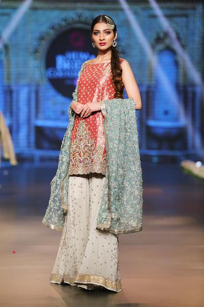 Asian designer embroidered dress in red, blue and white color