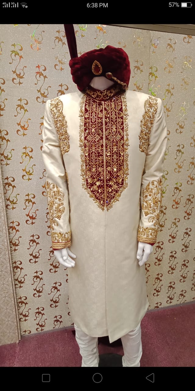 Pakistani Sherwani Royal Look In Off White Color. With  Jama War Cloth.Work Embellished With    Valvet Appliqué,Dabka And Zardozi Work.Royal Look Turban Also Available.