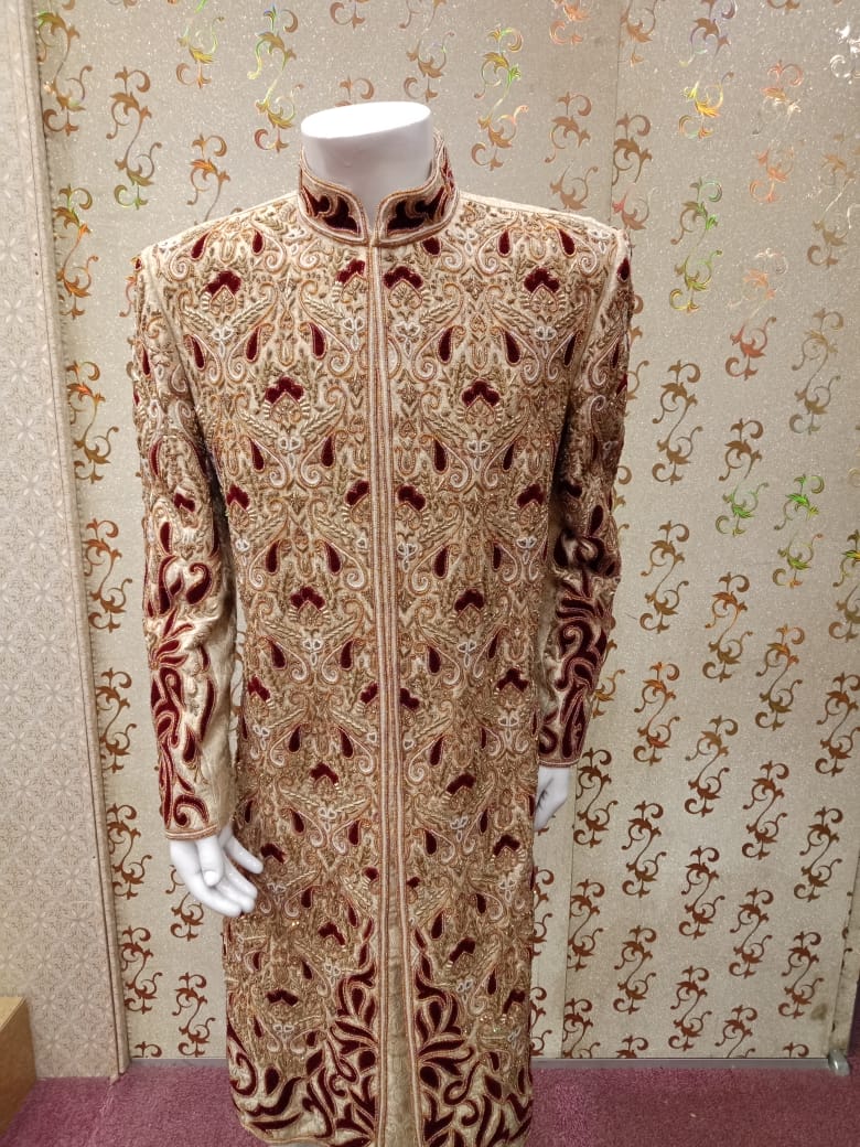 Dulha Sherwani In Offwhite Gold Color.Work  With Full Velvet Appliqué,Zardozi,Dabka & Stone Work. Same Work On Khusa.