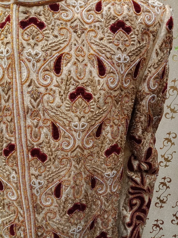 Dulha Sherwani In Offwhite Gold Color.Work  With Full Velvet Appliqué,Zardozi,Dabka & Stone Work. Same Work On Khusa.