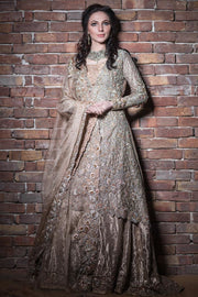 Elegant Pakistani bridal lehnga outfit in copper color