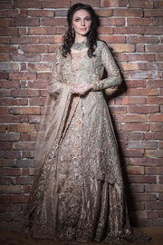 Elegant Pakistani bridal lehnga outfit in copper color