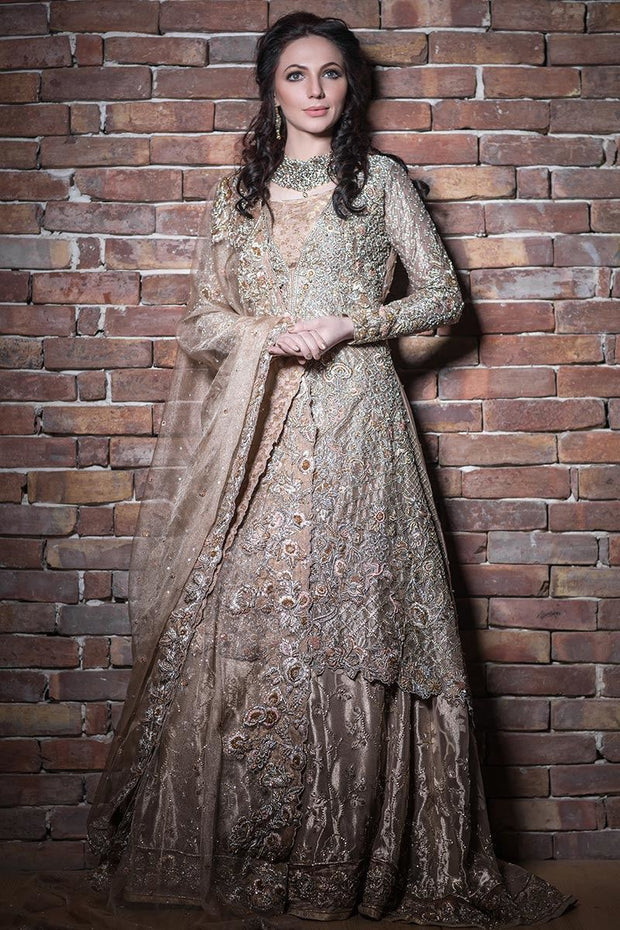 Elegant Pakistani bridal lehnga outfit in copper color