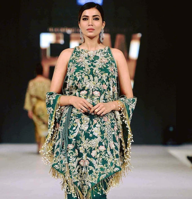 Beutifull wedding party dress in dark green color with heavy dabka and threds embroidery With crystal pearls and nagh work Model#1004