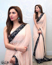 Stylish Indian Saree In Light Baby Pink Color.Work Embalished With Black Threads Embroidery And Sequance Borders.In Middle Of Saree All Sequance Work.