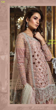 Pakistani Bridal Sharara in Beutiful Baby Pink Color By Maria.B With Cutwork Jaal,Handwork,Sequance,And Tilla Threads Embroidery. 