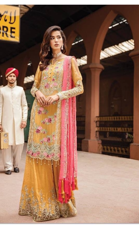 Stylish Sharara And Long Kameez.Work Embellished With Pure Threads Embroidery Tilla,Sequance,And Cutwork Patches.