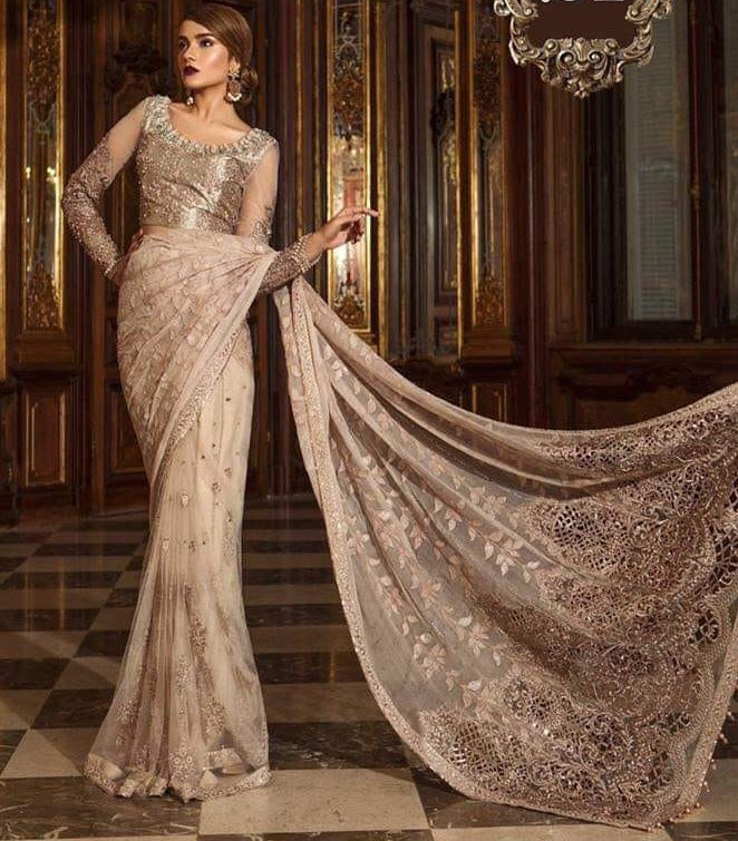 Designer Pakistani Saree In Pink Gold Color With Beautiful Handwork On Blouse Neck With Tilla,Threads Embroidery Sequance And Pearls Work.