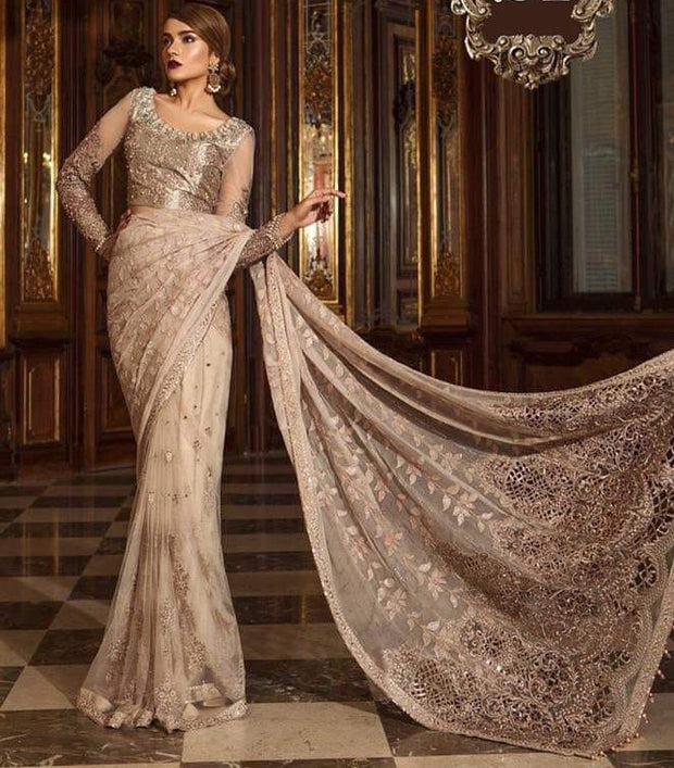 Designer Pakistani Saree In Pink Gold Color With Beautiful Handwork On Blouse Neck With Tilla,Threads Embroidery Sequance And Pearls Work.