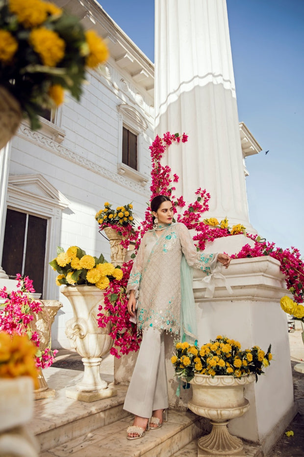 Beautiful dress by Imrozia in turquoise color