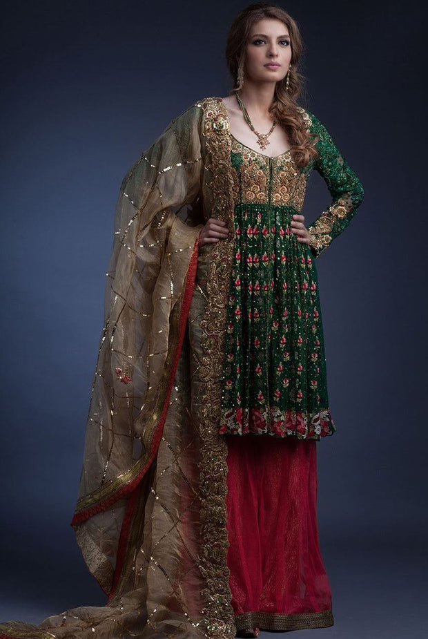Designer peplum sharara dress in green and pink color