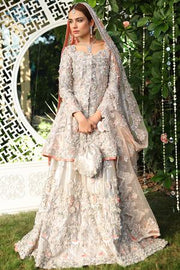 Latest bridal designer waleema dress in lavish rose gold color