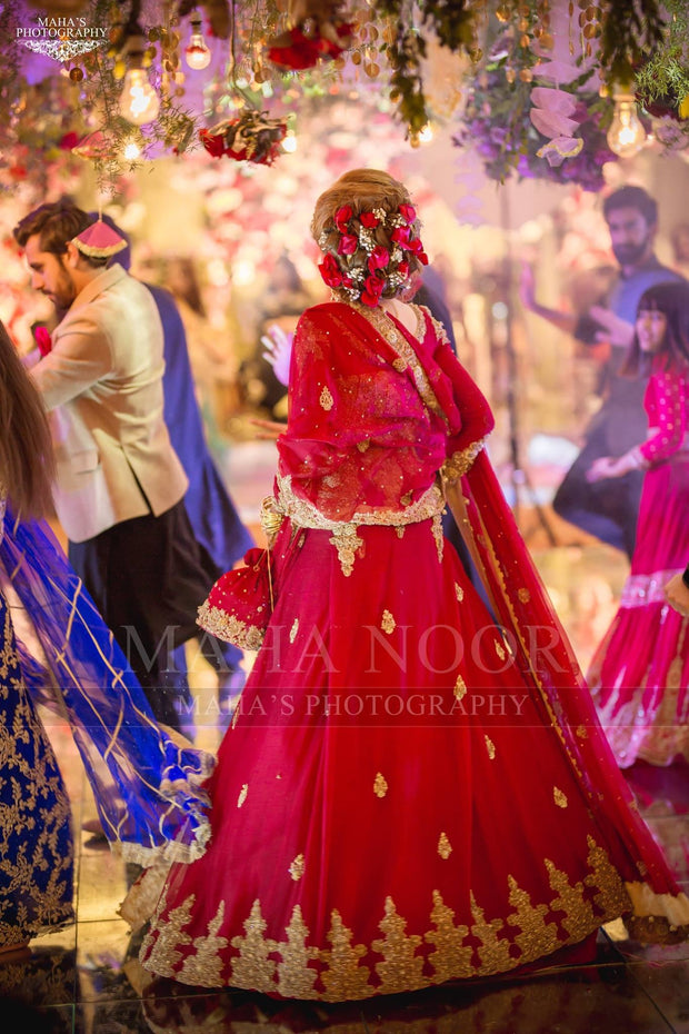Red Dulhan Maxi in Lahnga Shape.Stylish Bridal Lahnga Maxi Embalished With Pure Dabka Nagh Zari And Pearls Work.