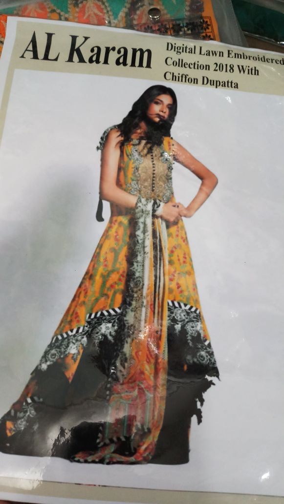 Beutifull lawn dress by alkaram in yellow black color Model L