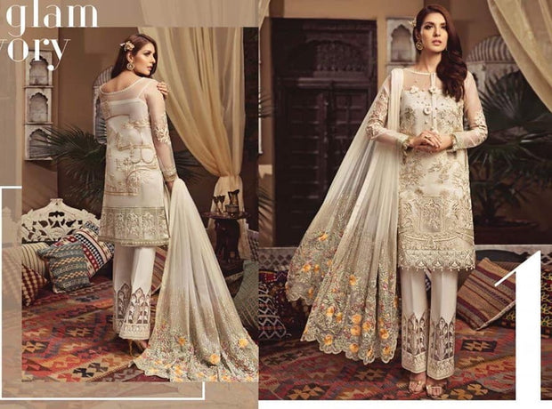 Pakistani Party Suit in Offwhite Color by Sarene.Work With Beautiful Dhaga Work Tilla Embroidery And Cutwork Patches.