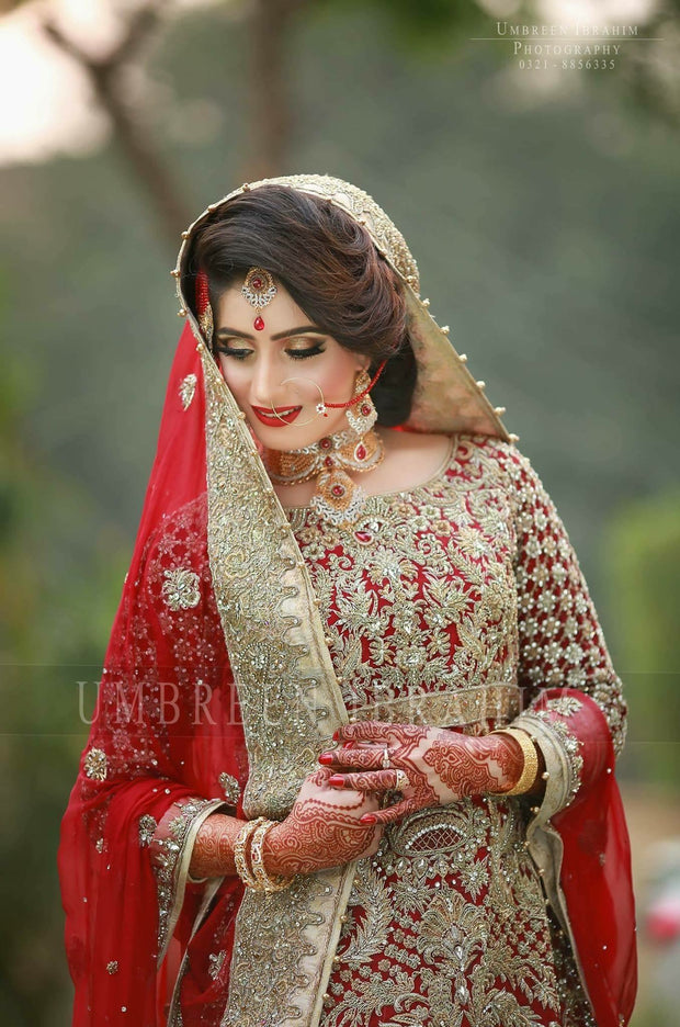 Beautiful bridal lahnga in rose red and golden color