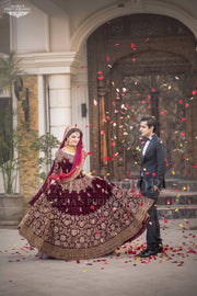 Bridal Reception Lahnga In Dark Maroon Color.Work Embalished With Pure Dabka Zari Sequance And Stone Work.