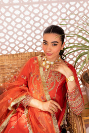 Elegant Pakistani Eid Dress in Orange Kameez Trouser Style
