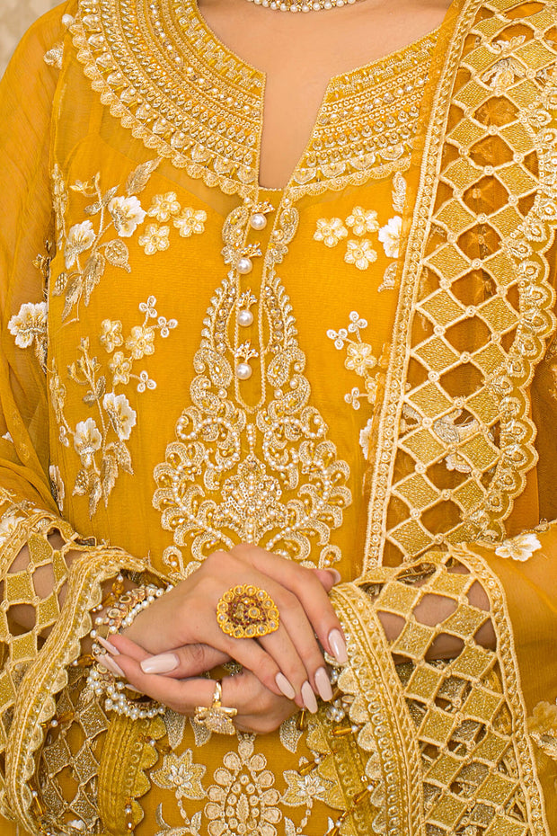 Elegant Pakistani Party Dress in Embroidered Yellow Kameez Trousers and Net Dupatta Style