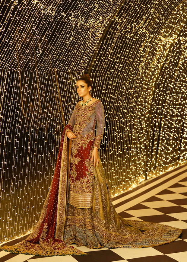 Embroidered Pakistani bridal lehnga in gold and maroon color