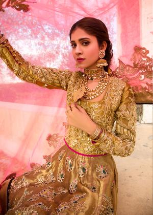 Pakistani embroidered frock dress for bridal wear in dull gold color