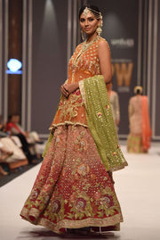 Beautiful embroidered mehndi dress embroidered in orange color 