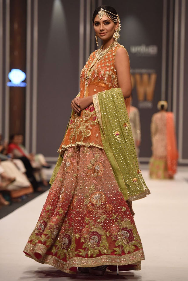 Beautiful embroidered mehndi dress embroidered in orange color 