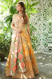 Beautiful embroidered mehndi outfit in yellow and peach color