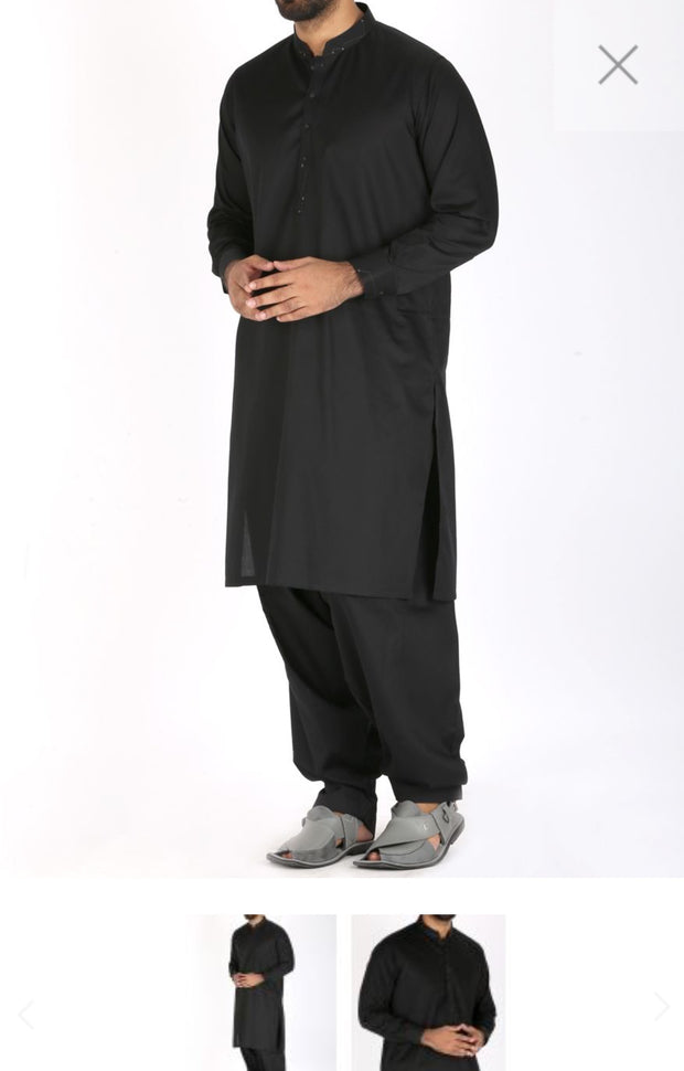 Black Men Suit By Junaid Jamshed. Work Embellished Plain Haming On Neck Collar And Sleeves Cuffs.