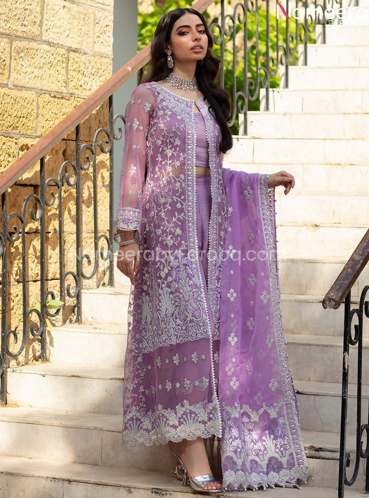 light purple pakistani dresses Lilac Luster Crafted on a serene shade of lilac, this magnificent chiffon attire with a fully embroidered and embellished shirt is elevated with the embroidered neckline, hem and sleeve pattis. Complemented