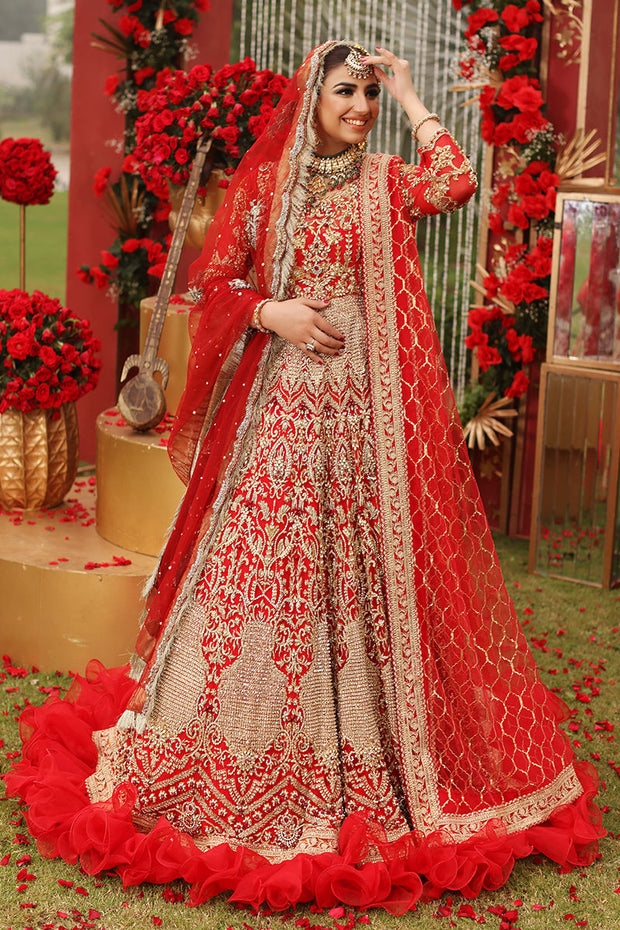 DEEP RED TRADITIONAL BRIDAL LEHENGA SET WITH GOLD EMBROIDERY PAIRED WITH A  MATCHING DUPATTA, JADE GREEN TASSELS AND ALL OVER GOLD EMBELLISHMENTS -  Seasons India