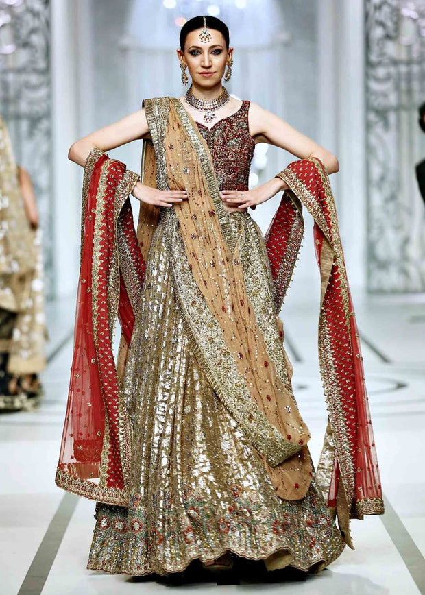 Golden Pakistani Designer Lehenga with Red Choli