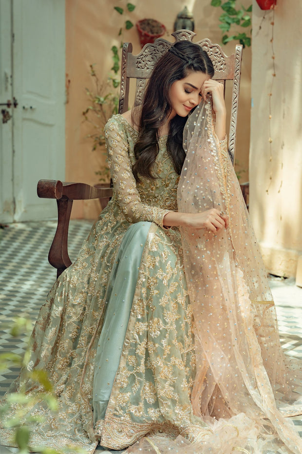 Image of Young Indian female wearing ethnic green floral summer dress with  jewelry and makeup-VX269514-Picxy