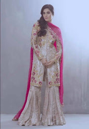 Beautiful gharara set in shoking pink and skin gold color Overall Look