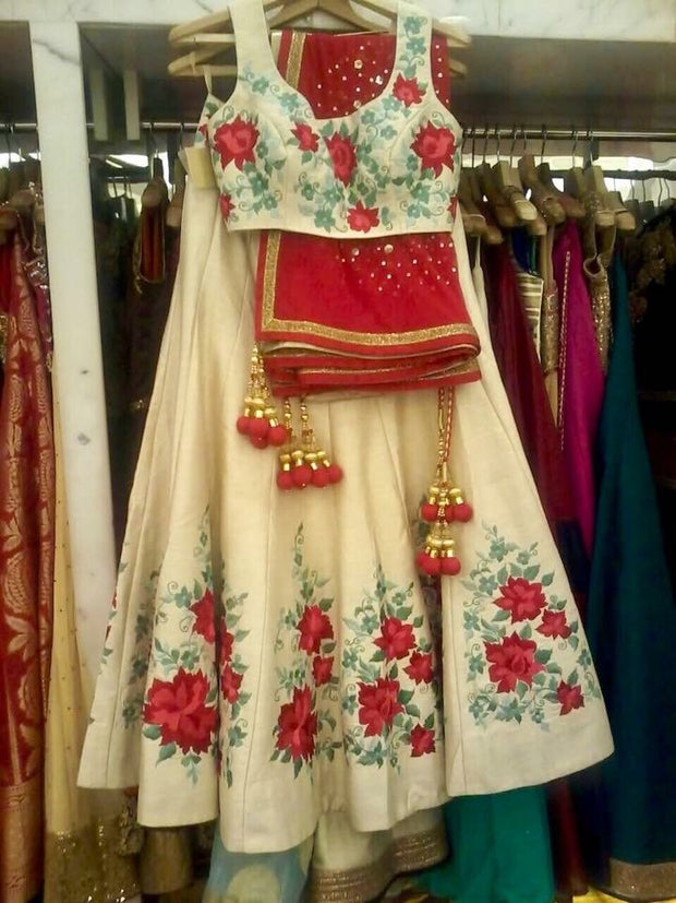 Beutifull hand lahnga set with threds work in offwhite gold and red color Model #W 888