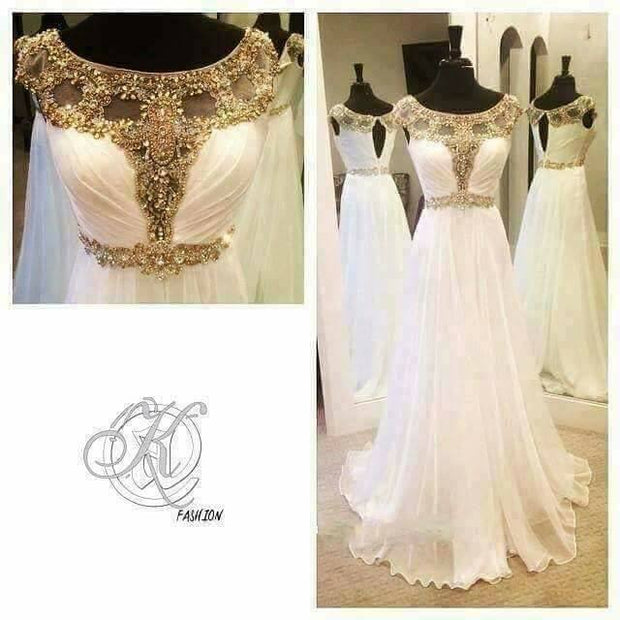 Beutifull maxi in white color with golden antique work Model #W 1111