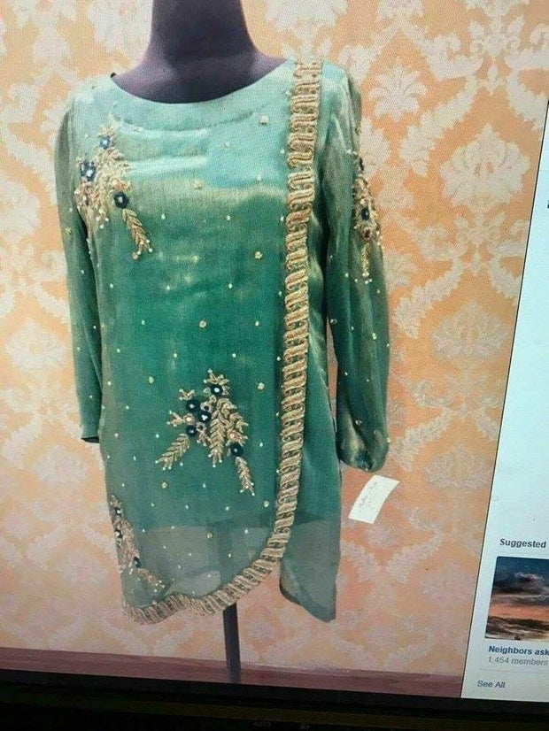 Wedding party dress in light bottle green color with dabka zari and pearls work Model#   P 299