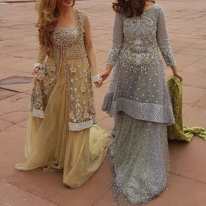 Wedding party lahnga set in net cloth with dabka zari nagh pearls and threads work Model# P 298