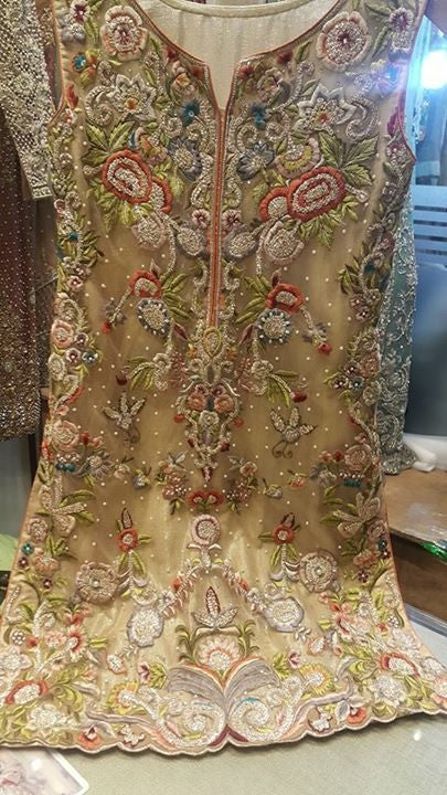 Wedding party dress in golden color with multi threads dabka zari pearls and nagh work Model#P 300
