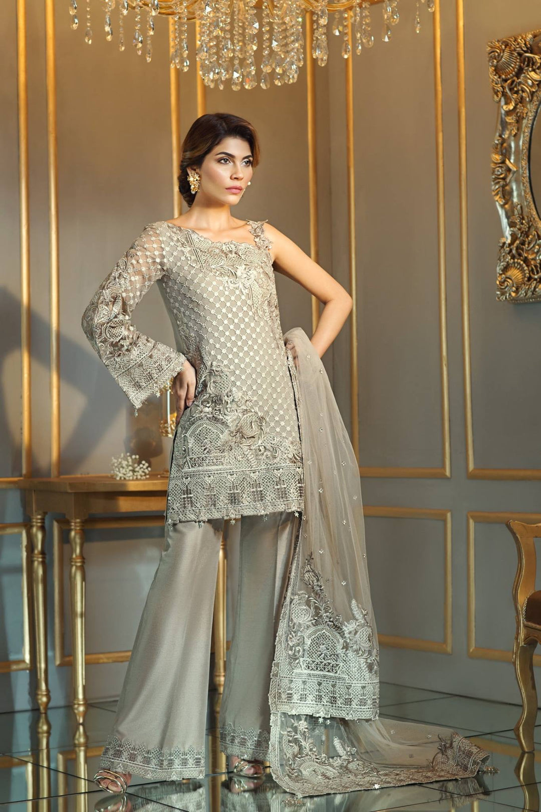 Chiffon dress by Anya in light brown color with threds embroidery and patches work Model # C 569