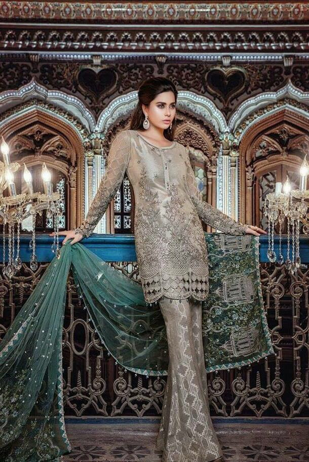 Chiffon dress by Maria b in silver gold color with threds embroidery and sequence work Model# C 562