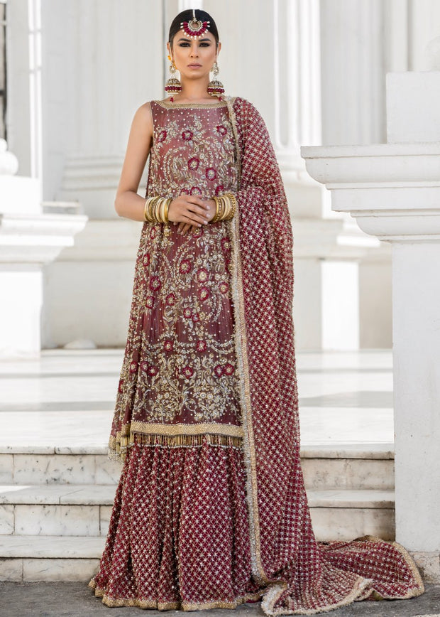 Beautiful embroidered Indian bridal outfit in reddish maroon color