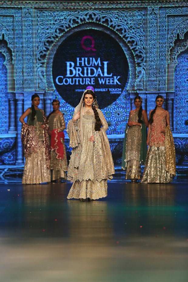 Indian designer embroidered dress in white and gold color # B3353
