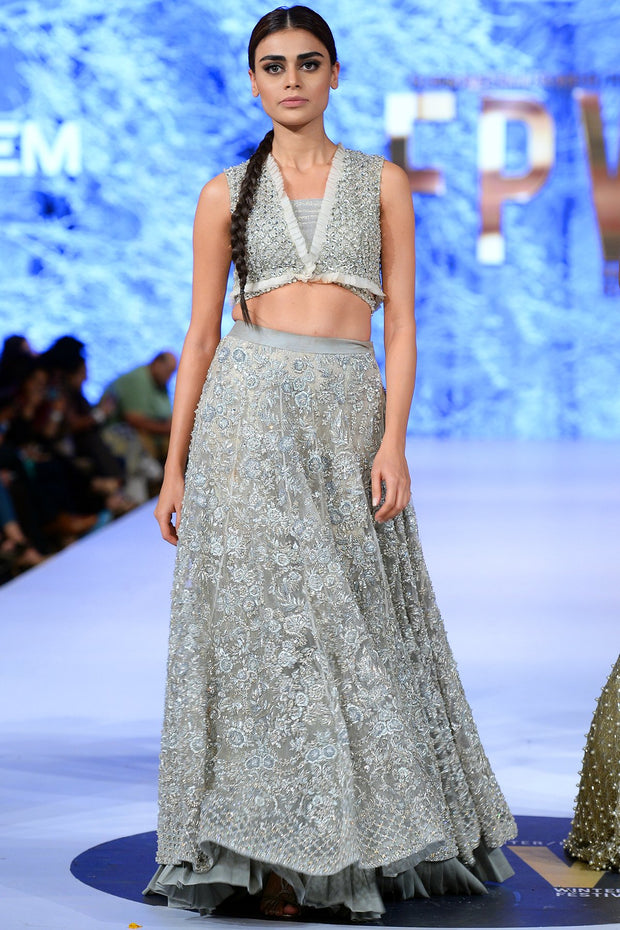 Beautiful Indian designer lehnga embroidered in lavish ivory color