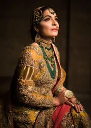 Indian embroidered bridal lehnga dress in mustard and pink color