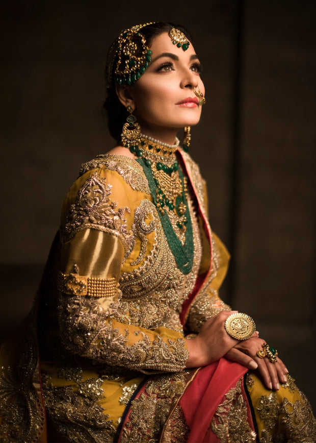 Indian embroidered bridal lehnga dress in mustard and pink color