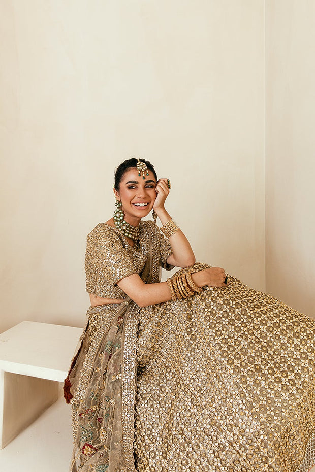 Gold lehenga hotsell online