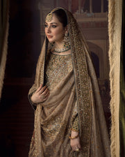 Latest Embellished Pakistani Bridal Dress in Lehenga Choli Dupatta Style in Premium Tissue Fabric